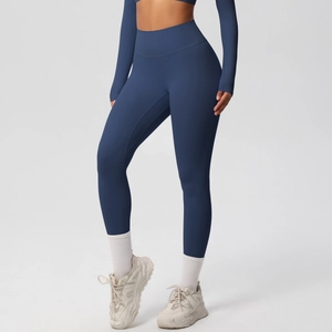 Detail view of seamless dark blue high-waisted yoga pants with brushed texture for fitness
