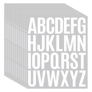 Stack of 10 sheets of uppercase A-Z alphabet stickers with white letters on grey background