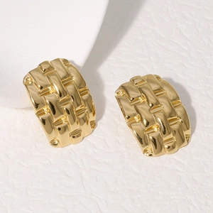 Detailed close-up of 18k gold plated stainless steel stud earrings with woven texture