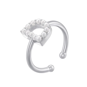 Detailed view of silver ring featuring an elegant pearl-inlaid letter D design