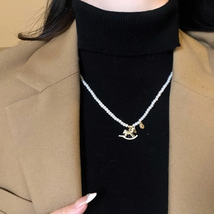 Artificial Pearl Necklace With Gold Rocking Horse Pendant And Zircon Round Charm Elegant Choker For Women Luxury Style Jewelry