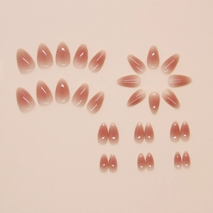 Glossy almond press-on nails set with nude pink to coffee brown gradient jelly finish