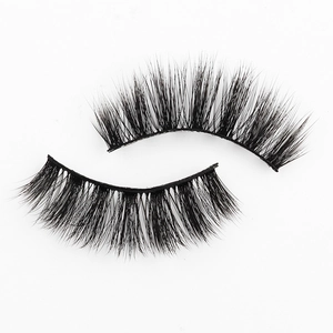 Close-up of 3D faux mink false eyelashes with dense volume and natural curled fibers