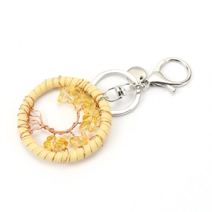 Handmade Tree of Life keychain with yellow crystal stones and beige suede wrap
