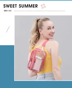 Pink strap detail on clear PVC cross-body bag showing storage for daily essentials