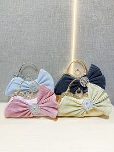 Sparkly handmade rhinestone evening clutch with bow knot design in multiple colors