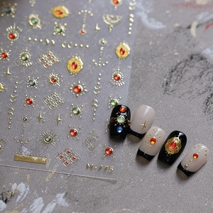 Gold embossed nail stickers M-775 with moon and star patterns and colorful rhinestones