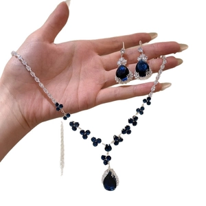 Silver drop jewelry set with blue teardrop stones and zircon flower necklace and earrings