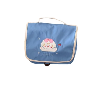 Cute puppy embroidery makeup bag in light blue with hanging hook for travel