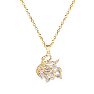 Sparkling crystal swan necklace in gold-plated titanium steel on white background
