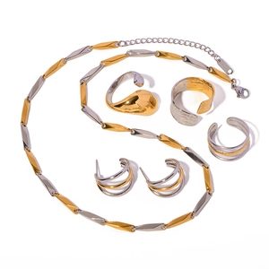 Two-tone geometric titanium steel jewelry set with gold and silver necklaces and rings