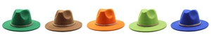 Row of colorful wool fedora hats with bold gold metal chain bands on white background