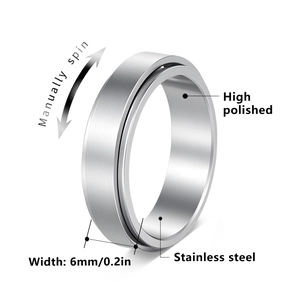6mm silver stainless steel spinner ring with brushed finish and polished inner band
