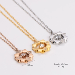 Three colors of clover flower pendant necklaces in rose gold, gold, and silver finishes