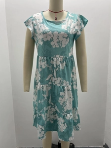Detailed view of teal floral sleeveless midi dress with tiered ruffle cake skirt