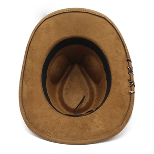 Detail view of brown faux suede cowboy hat interior with adjustable strap and braided trim