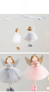Detailed view of angel ornaments with pearl crowns and glittery wings for Christmas trees