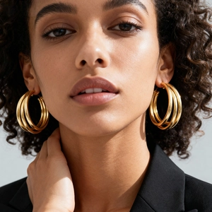 Three-layer gold round hoop earrings in a minimalist geometric metal design for women