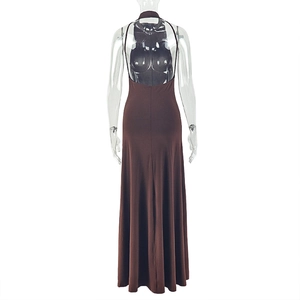 Deep V-shaped open back detail on a slim fit dark brown halter neck maxi dress