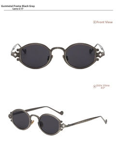 Detailed view of steampunk sunglasses with gunmetal engraved frames and grey oval lenses
