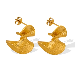 Minimalist gold fan-shaped stud earrings with hammered texture on white background