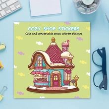 Flat lay of Cozy Shop PET stickers with a cute cartoon house for DIY journaling