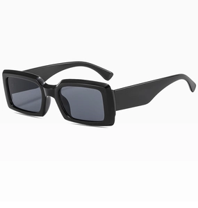 Detail of glossy black square frame sunglasses with thick temples and dark lenses