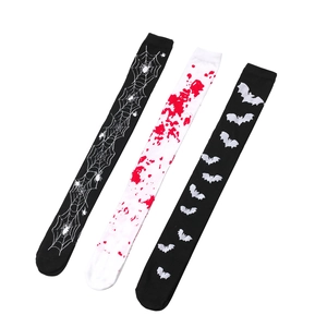 Detailed view of Halloween over-the-knee socks with blood, bat, and spider web patterns