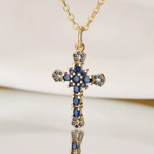 18K gold plated cross pendant necklace featuring micro-paved deep blue zircon gemstones
