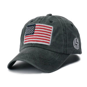 Detail of embroidered American flag and USA logo on charcoal distressed cotton cap