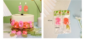 Dettaglio di candeline di compleanno a stella rosa e arancioni con misure e confezione