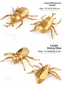 Vue détaillée des modèles de scarabée et d'abeille dorés avec dimensions et fini métallique