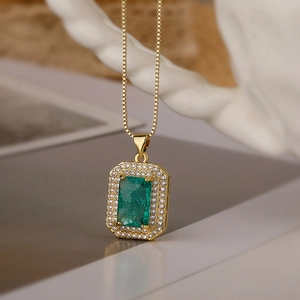 Minimalist 18K gold plated necklace featuring a rectangular emerald zircon pendant