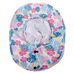 Detail of tropical floral print sun hat showing the interior label and adjustable chin strap