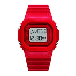 Detail of red square digital watch face showing LED display and function buttons