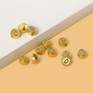 Flat round gold acrylic letter beads for DIY jewelry making and handmade necklaces