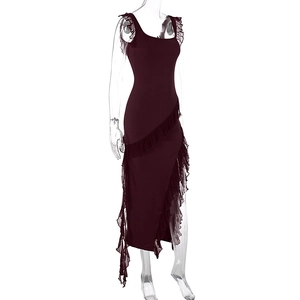 Detail of ruffled hem and side slit on a burgundy slim-fit sleeveless midi dress