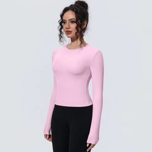 Haut de sport rose à manches longues en tissu élastique à séchage rapide pour yoga