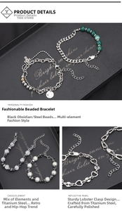 Close-up of titanium steel beaded bracelet with cross pendant and hematite stone