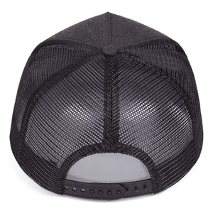 Detail view of the black mesh back and adjustable snapback closure on a trucker hat