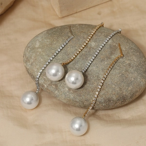 Elegant long cubic zirconia and white pearl tassel drop earrings in gold and silver finish