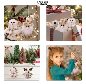 Christmas plush ornaments set on tree and gift boxes featuring reindeer and snowman