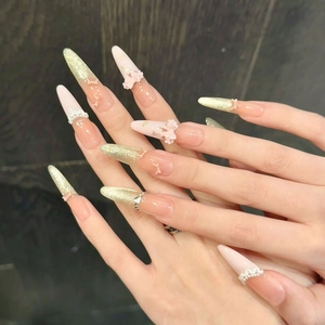 Romantic French stiletto press-on nails with pink cat-eye pearls and golden glitter