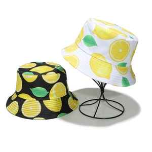 Women's summer sun hat with lemon fruit print in black and white cotton bucket styles