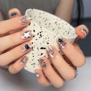 Sweet pink cat eye press-on nails with cute black cat, stars and MEOW MEOW patterns