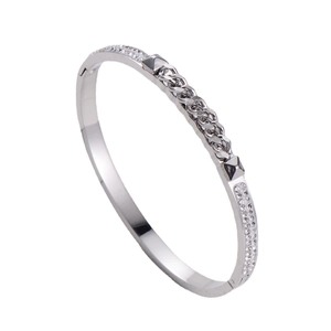 Silver stainless steel bangle with woven chain, pyramid studs and cubic zirconia rows