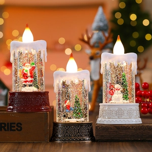 Christmas LED snow globe lanterns with Santa and snowman on a warm wooden tray