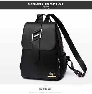 Detail of black pebbled leather backpack with gold H-buckle and kangaroo emblem