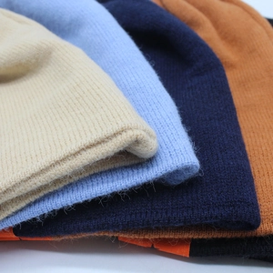 Thick ribbed knit wool beanies for women in multiple colors with a soft plush texture