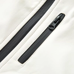 Women's waterproof ski jacket with premium black sealed zippers and precise stitching details